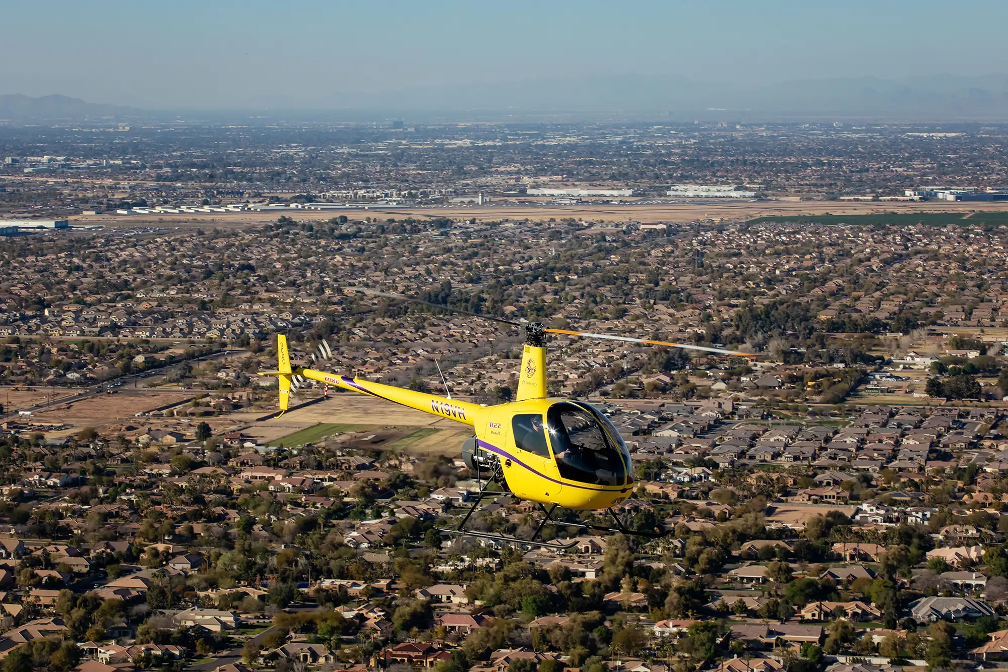 helicopter flying over city