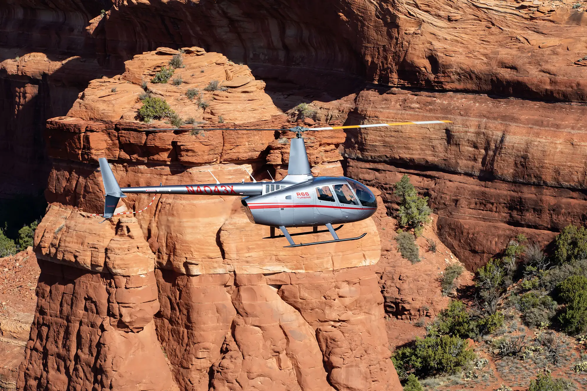 Aerial photography of helicopter flying in Sedona Arizona