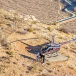 Aerial photography of chopper on ground in desert