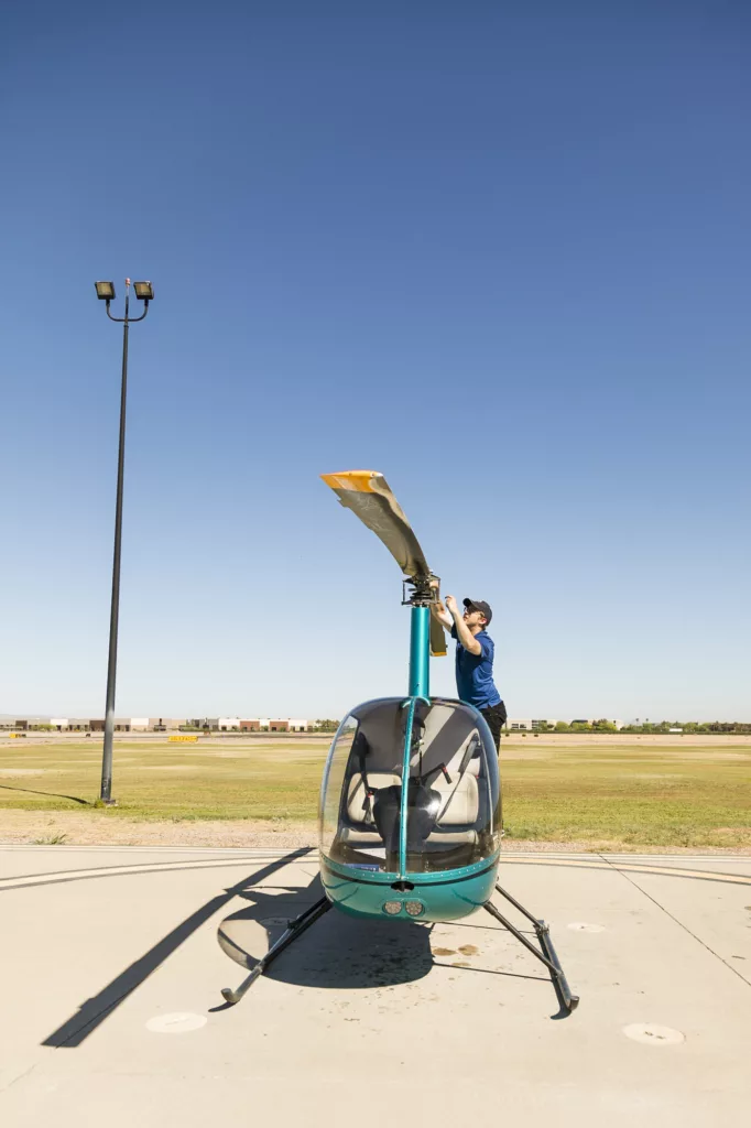 Checking the propeller on helicopter